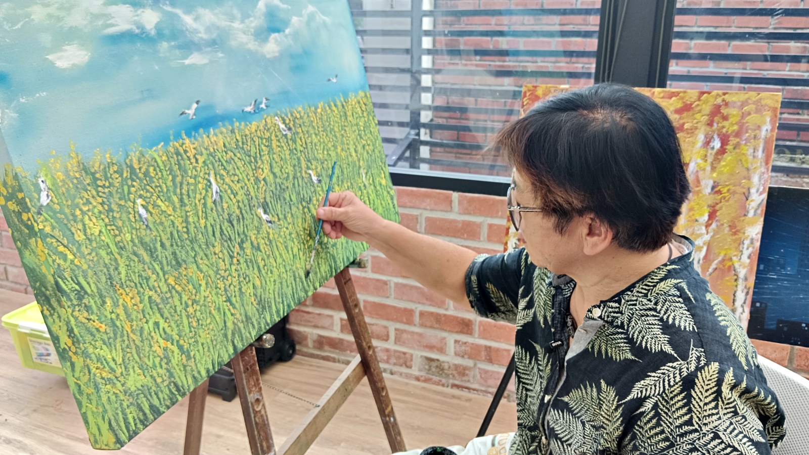 ■傅素美画出自己家乡的美景─沙瓦令（Sawah Ring）稻田。